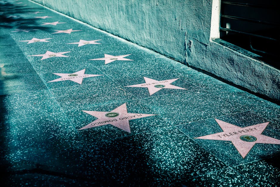 View of Hollywood Walk of Fame with stars on the sidewalk in Los Angeles, California